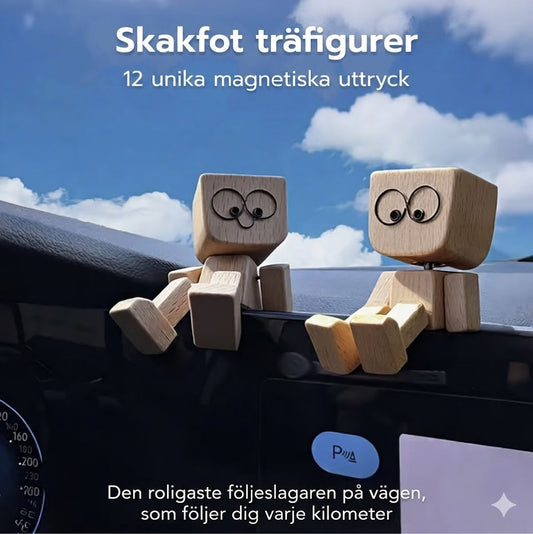 Charmigt litet gungfigur i trä med 12 magnetiska uttryck